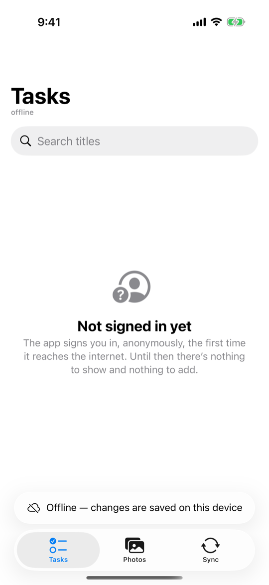 The Tasks tab before the first sign-in, offline: the subtitle says offline, the list says "Not signed in yet", there is no + button, and the status above the tab bar says changes are saved on this device